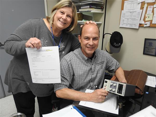 Ms. Hawkins and Mr. Adomatis with their Mini-Grant applications.